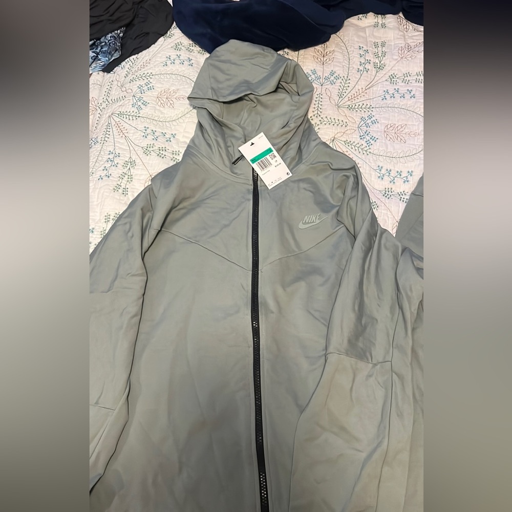 Nike men’s tracksuit Xl brand new price for both.